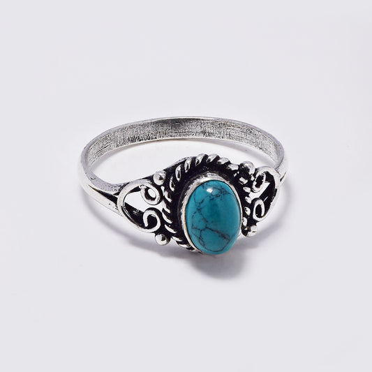 Brass ring with long oval and decorative shank gemstone