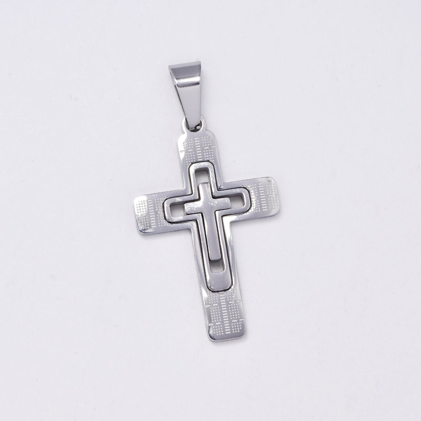 SSMP2999 - Steel 40mm x 25mm line & dotted cross pendant