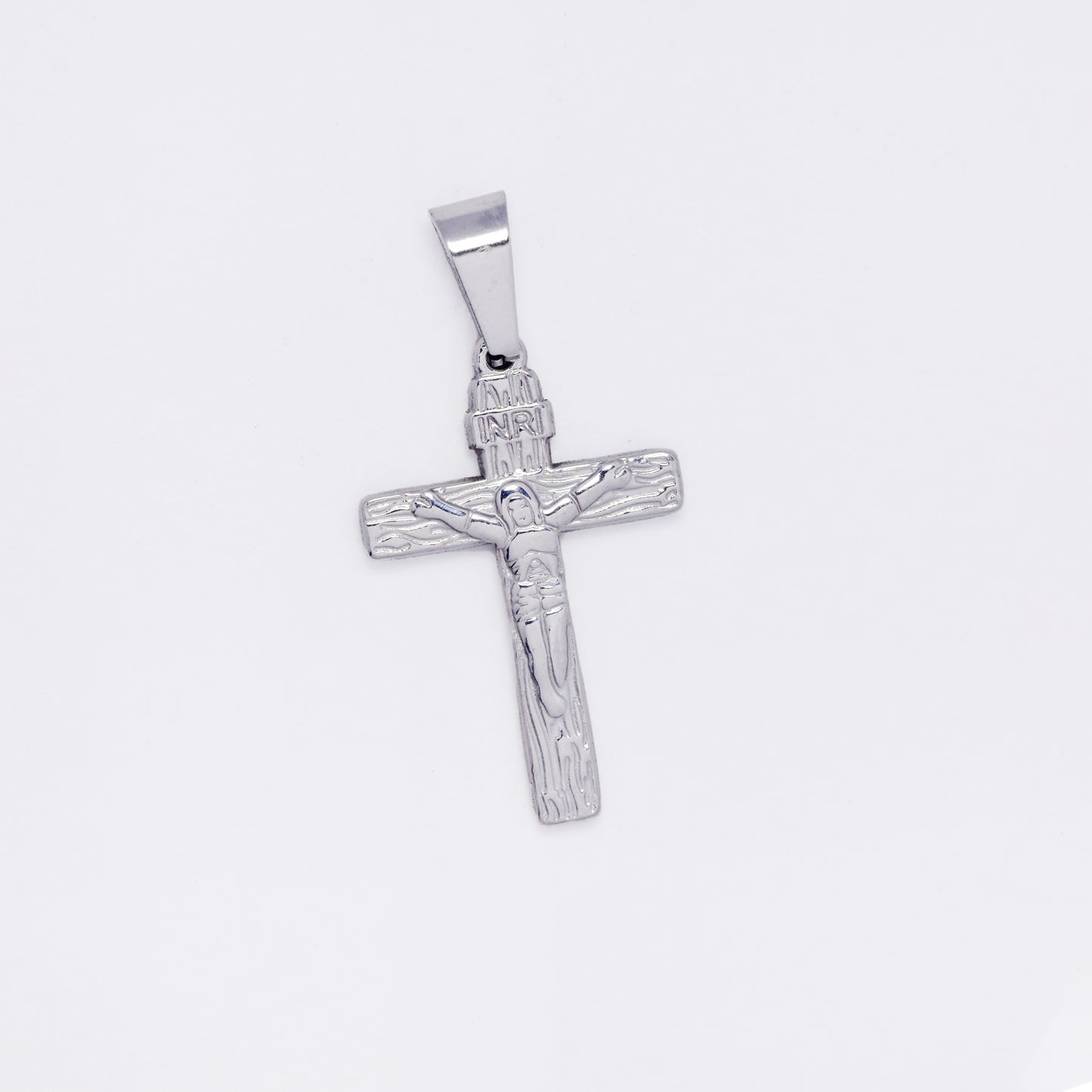 SSMP3233 - Steel 25mm x 16mm textured crucifix pendant