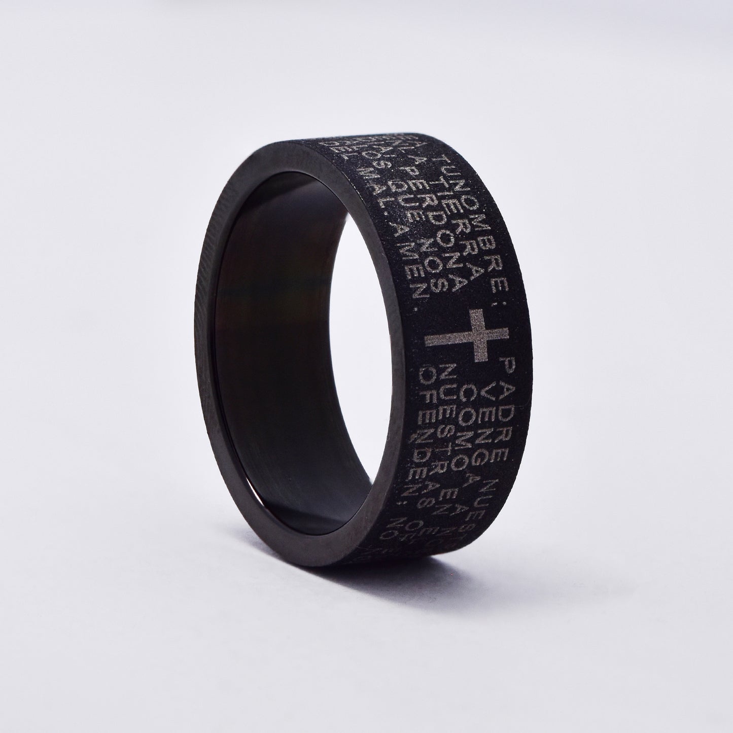 SSMR3086 - Steel 8mm x 2mm black glitter Spanish Lord's Prayer ring