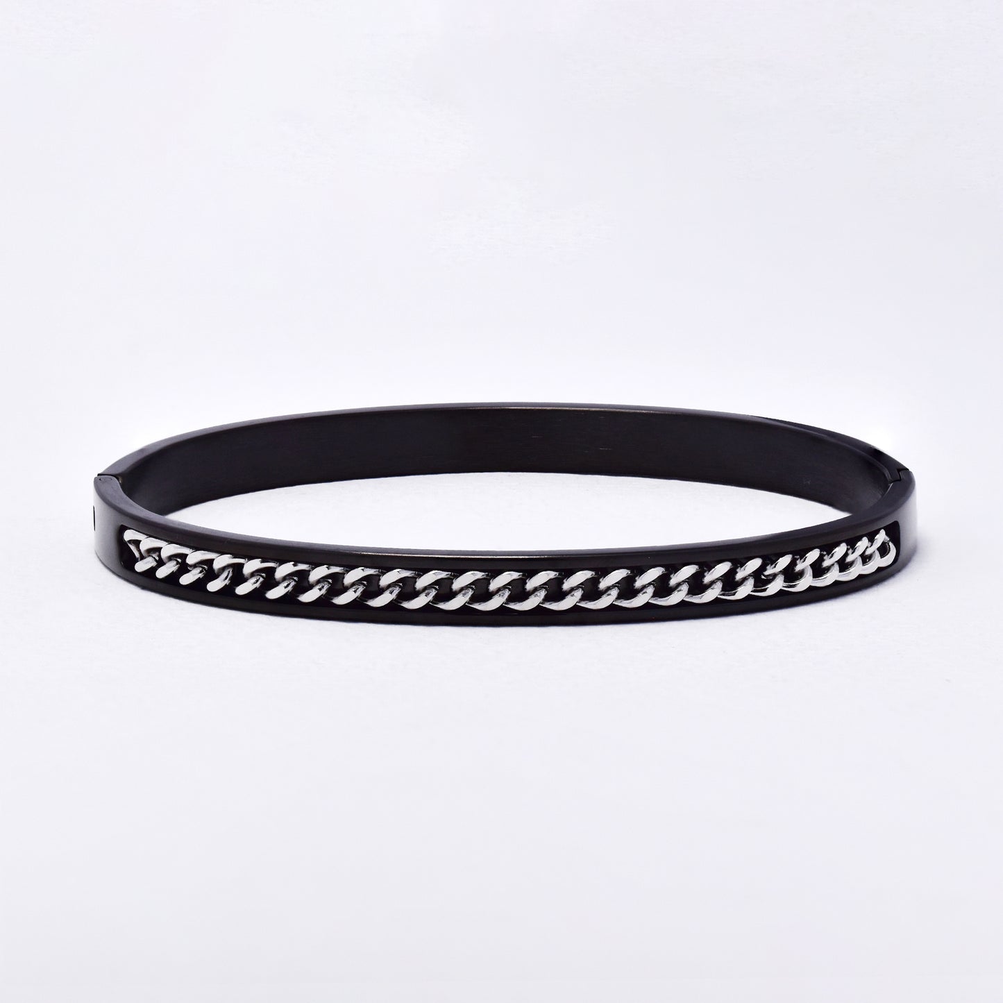 SSYB6287-SBLK - St Steel 69mm x 57mm x 6mm hinged bangle with chain detail