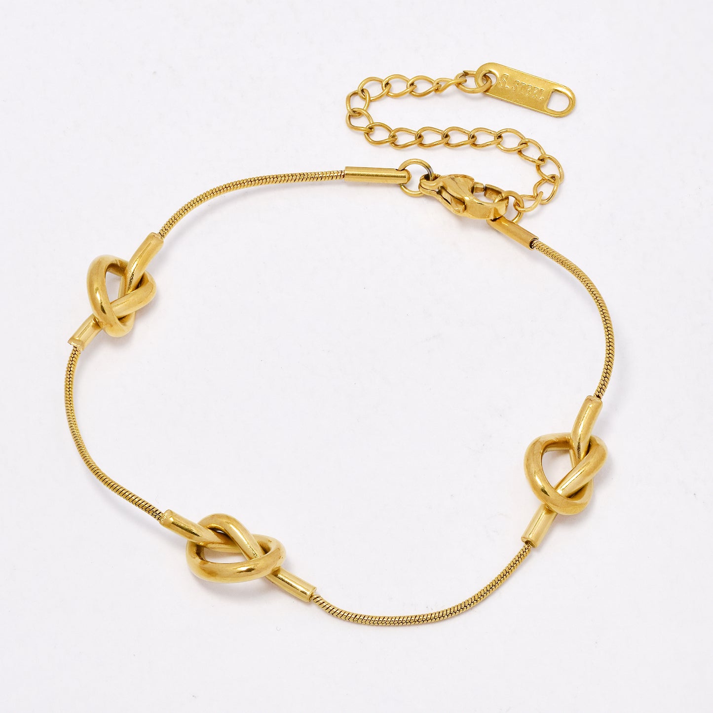 SSYB6544 - St Steel 17cm + 4.5cm tripple knot bracelet