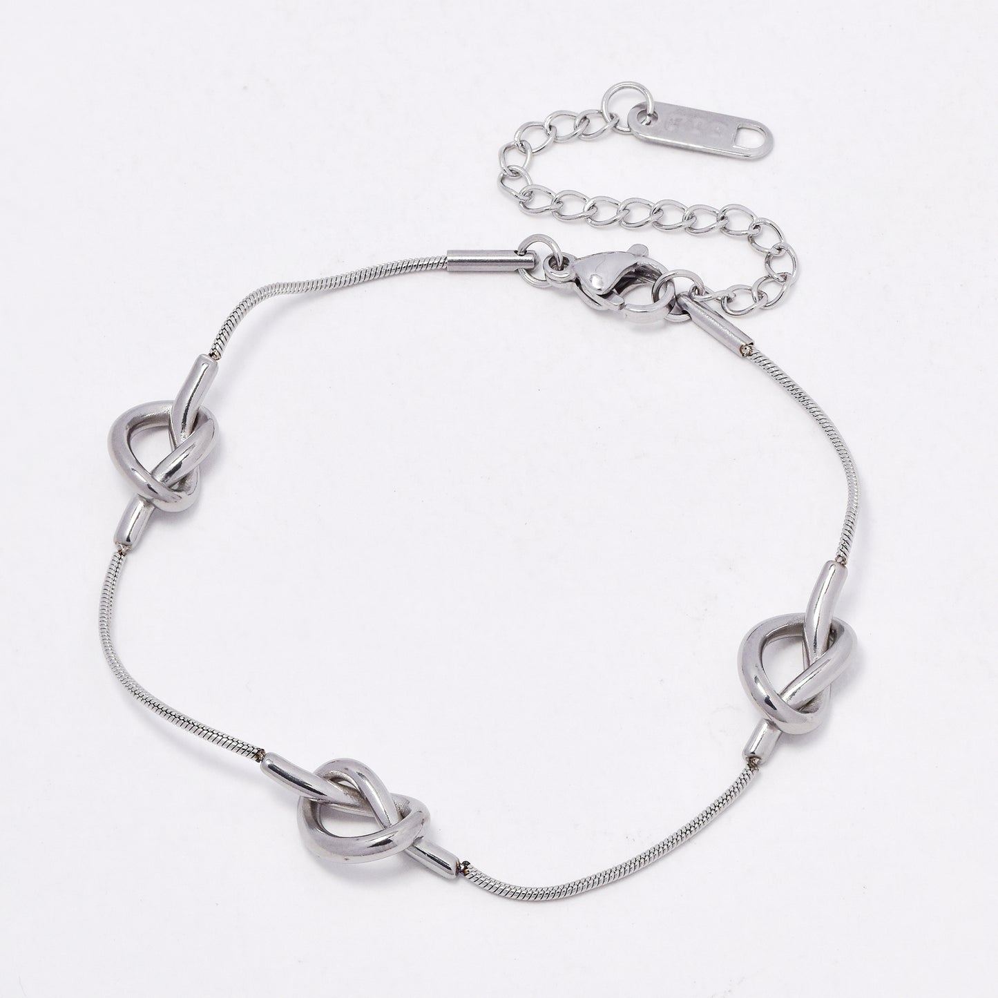 SSYB6544 - St Steel 17cm + 4.5cm tripple knot bracelet