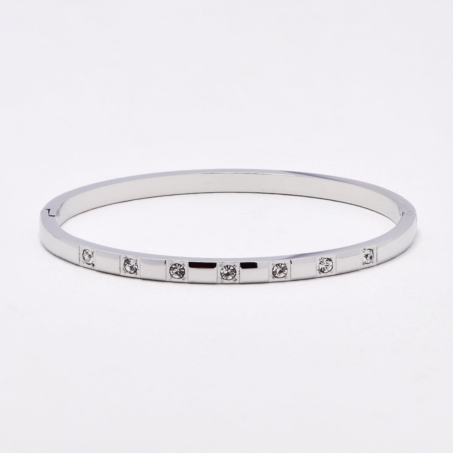 SSYB6612 - St Steel 60mm x 50mm x 4mm oval hinged CZ bangle