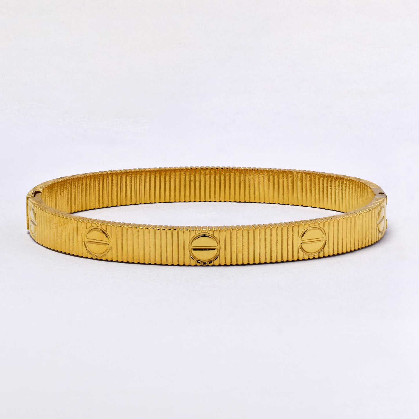 SSYB7210 - Steel 60mm x 50 mm x 7mm textured oval hinged bangle