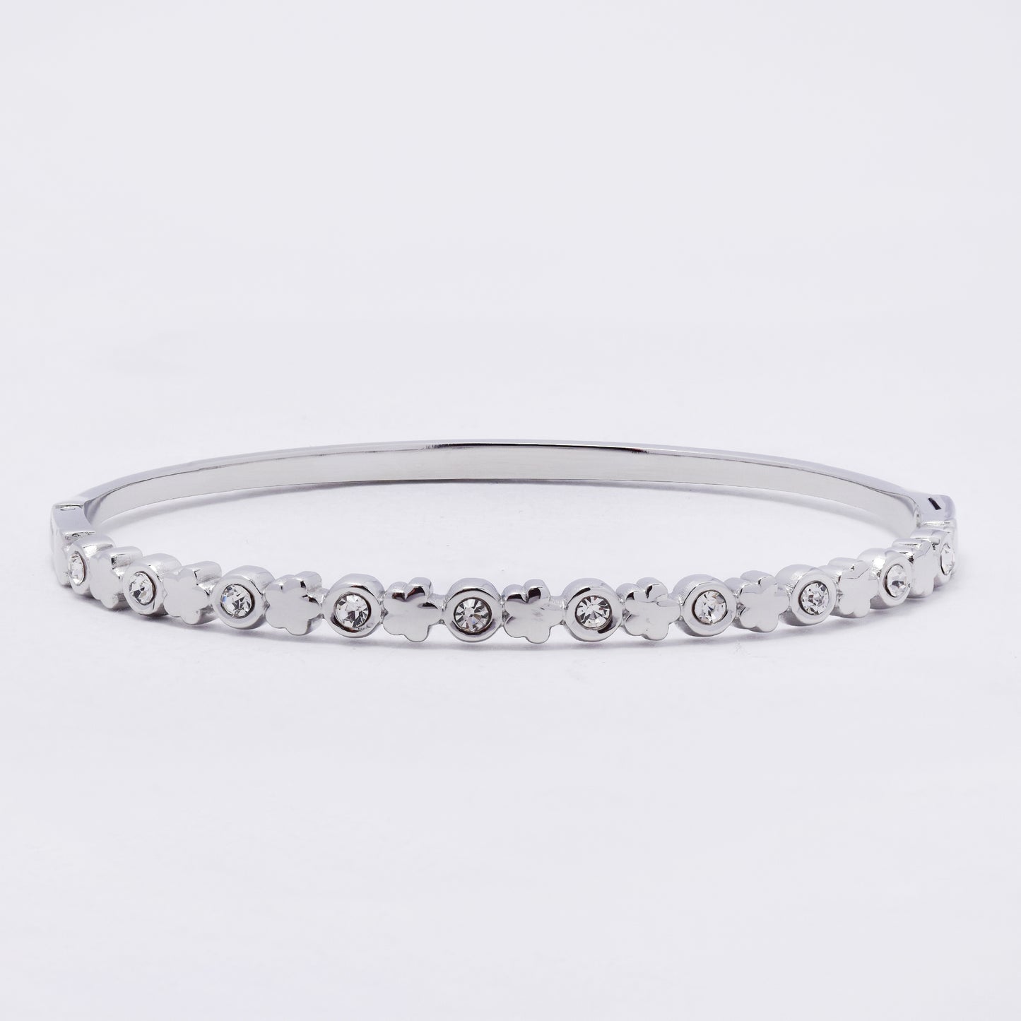 SSYB7256 - Steel 59mm x 50mm x 4mm CZ and flower hinged bangle
