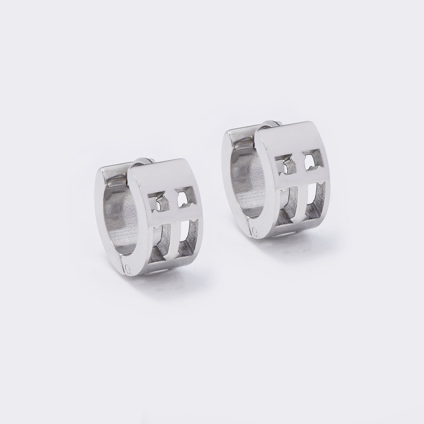 Steel 13x7mm cutout cross huggies - SSYE5567