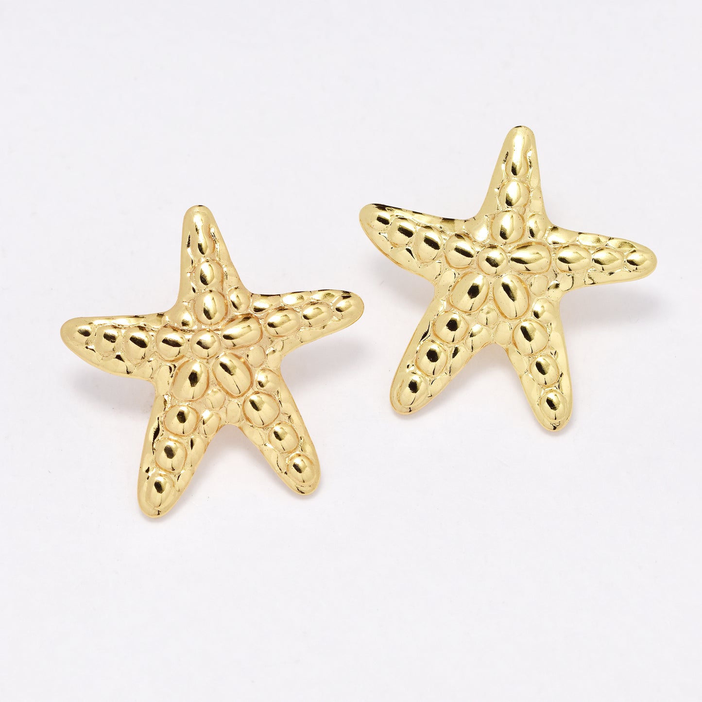 SSYE6382 - St Steel 26.8mm textured starfish earring
