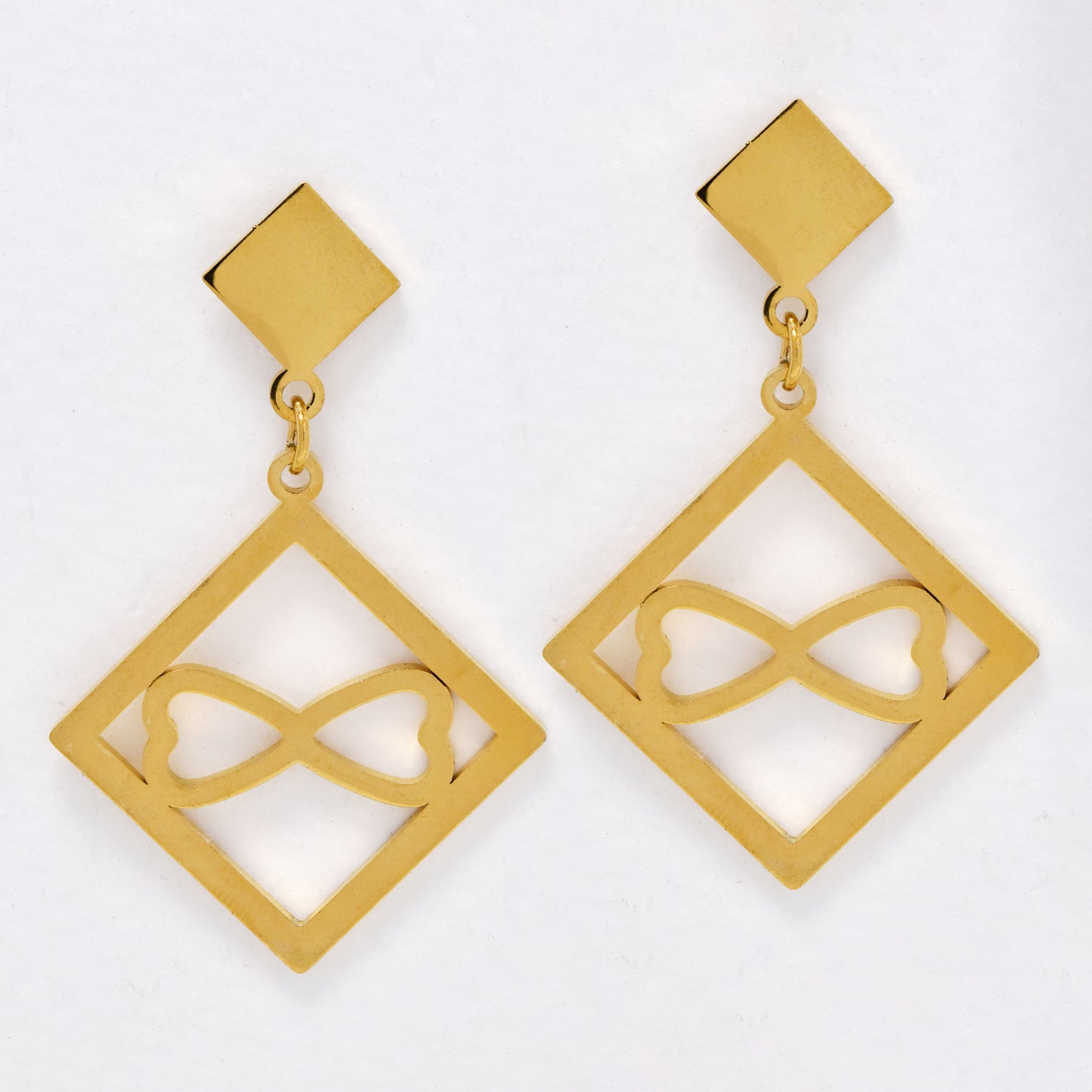 SSYE6658 - St Steel 40mm x 25mm cutout diamond bow drop earring