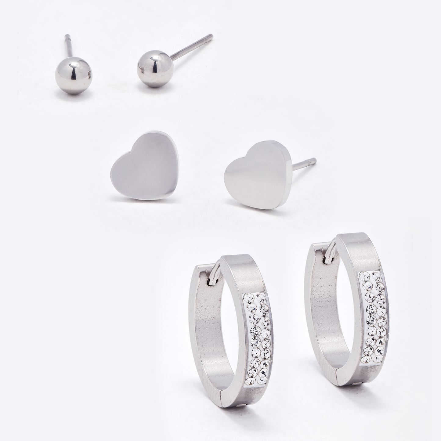 SSYE6751 - St Steel round crystal huggie, heart & round stud set