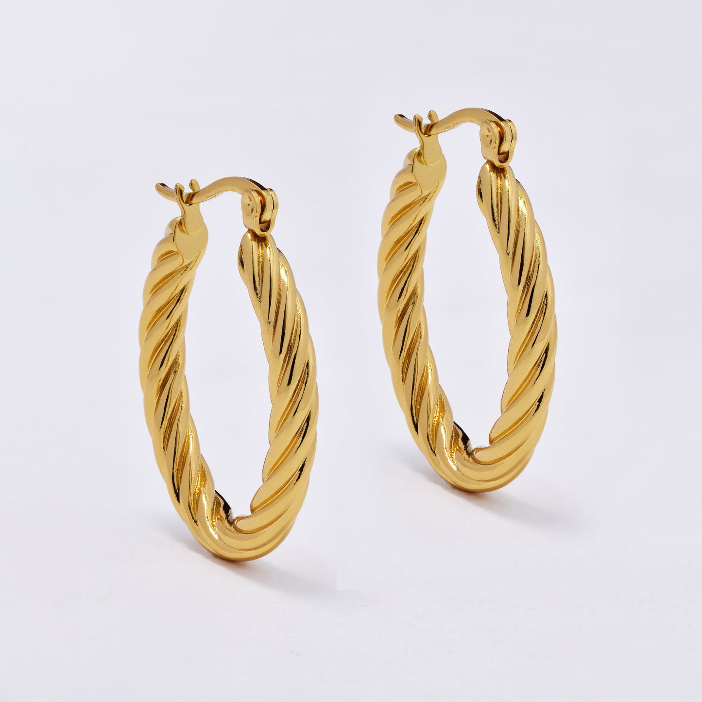 SSYE6817 - Steel 28mm x 4mm oval twisty hoop earrings