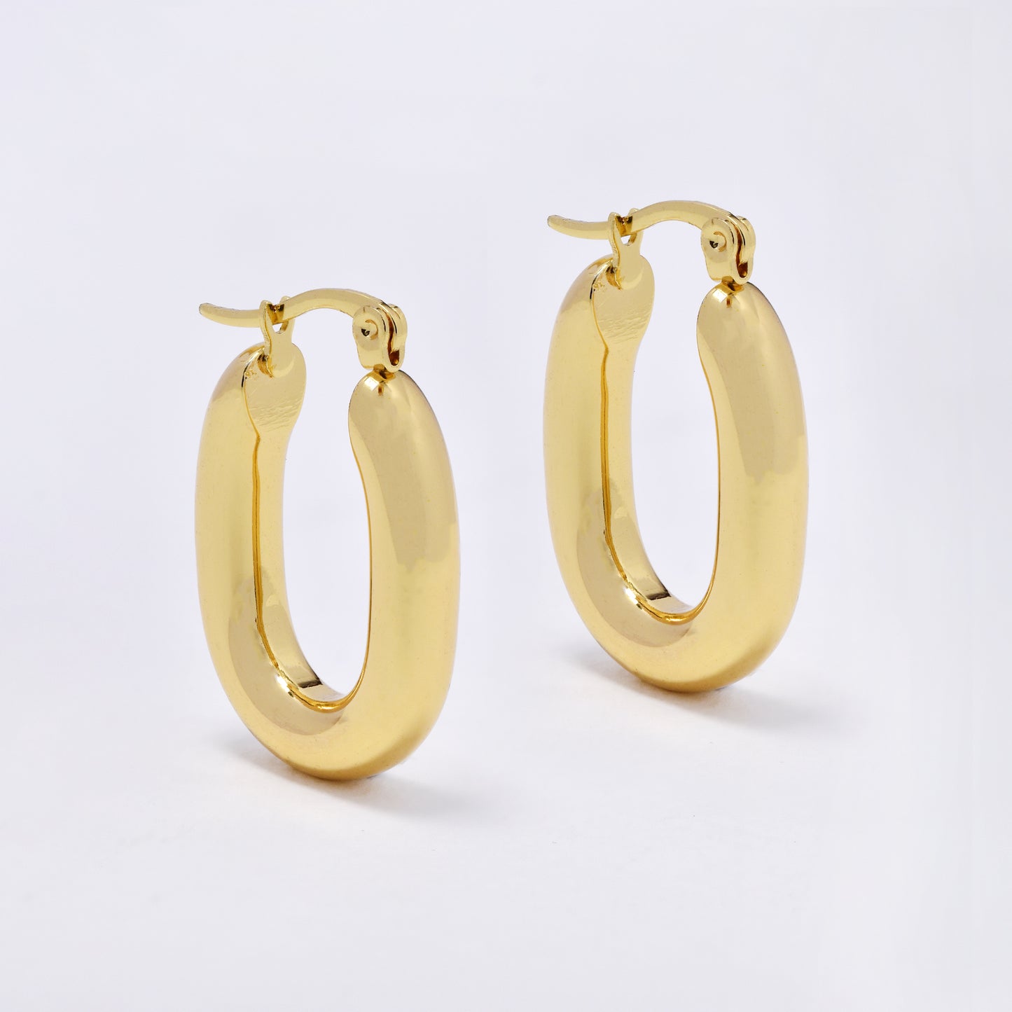 SSYE6821 - Steel 24mm x 5mm oval hoop earrings