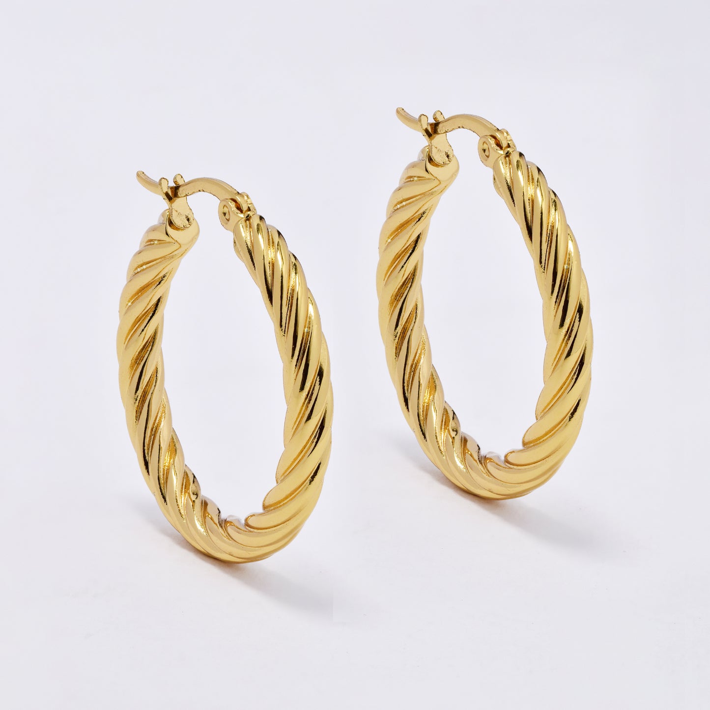 SSYE6825 - Steel 30mm x 4mm twisty hoop earrings