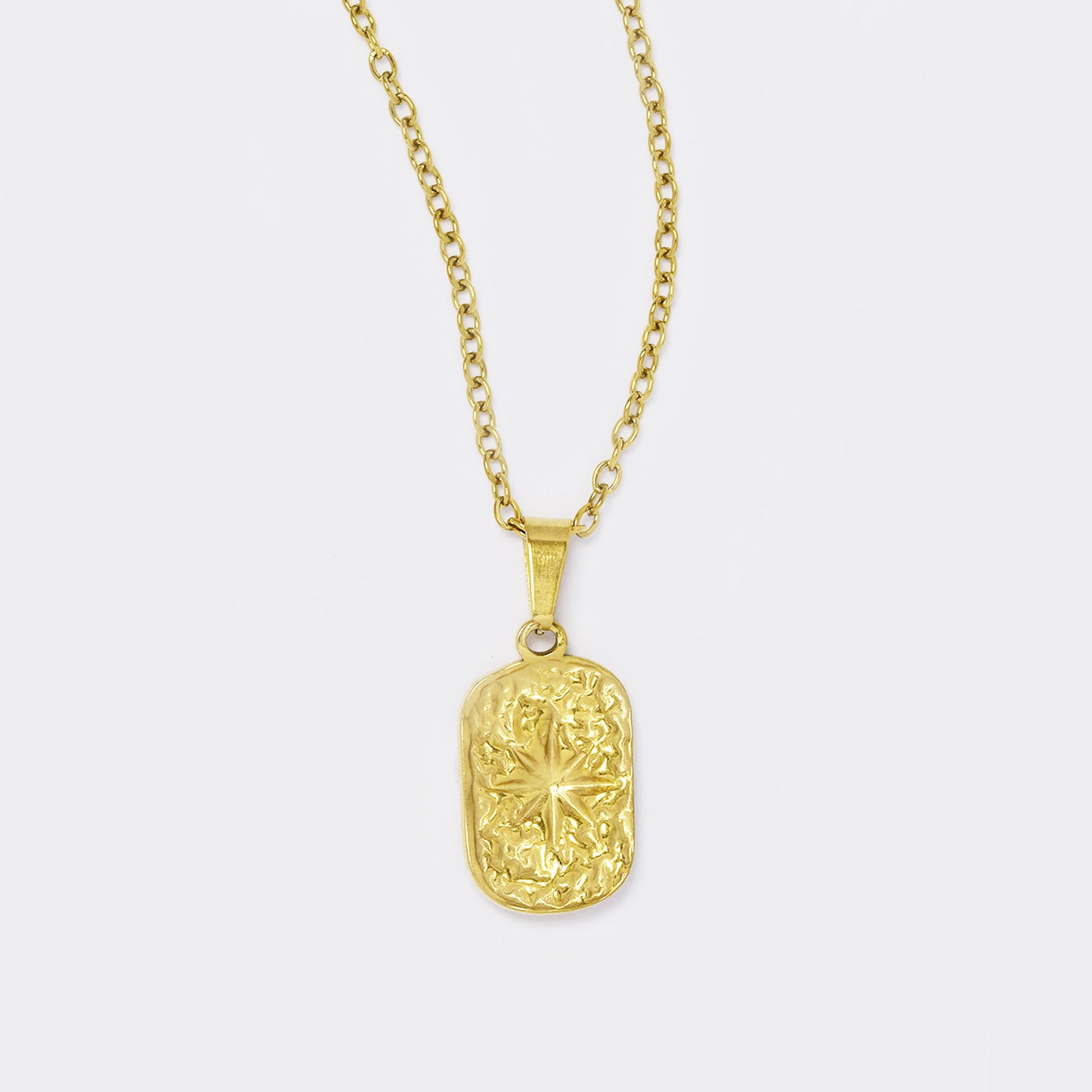 Stainless steel gold textured oval disk with eight point star necklace - SSYN5630