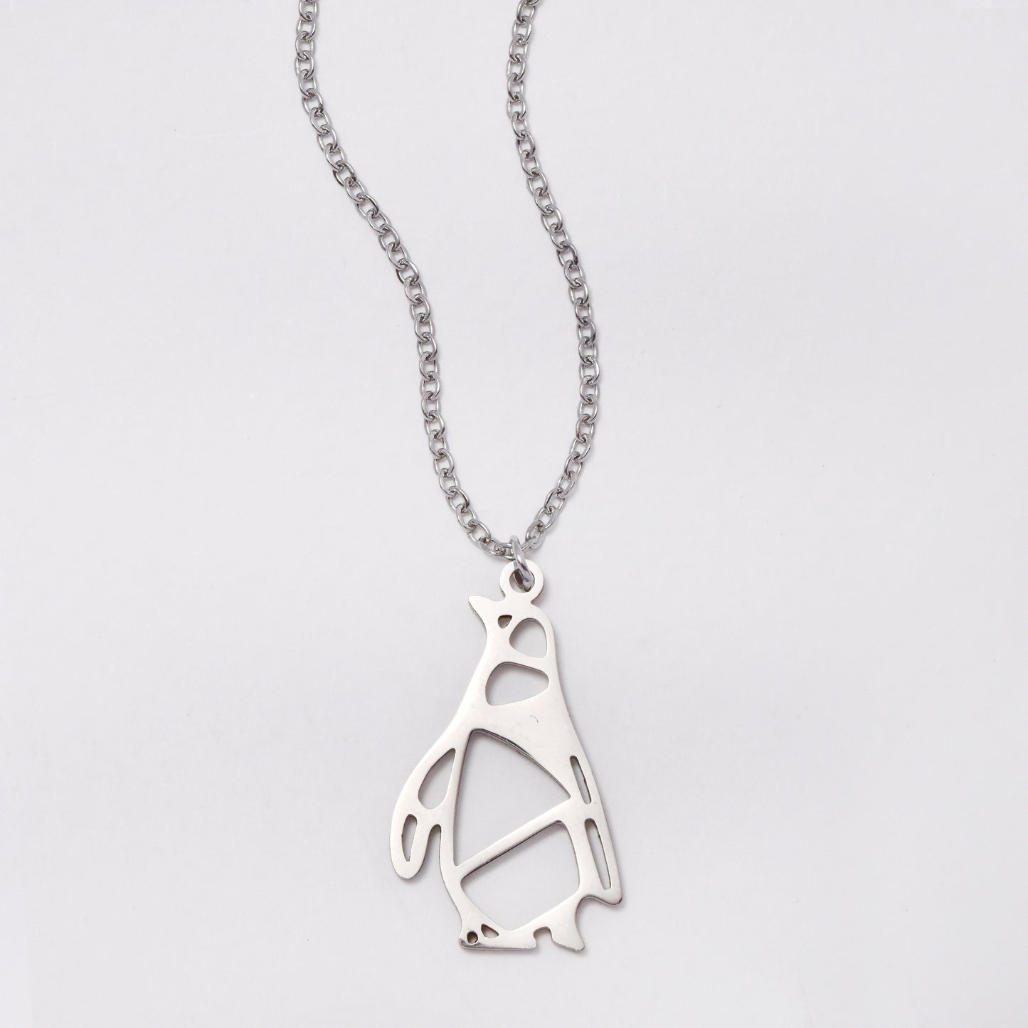 SSYN5884 - Steel cutout penguin necklace