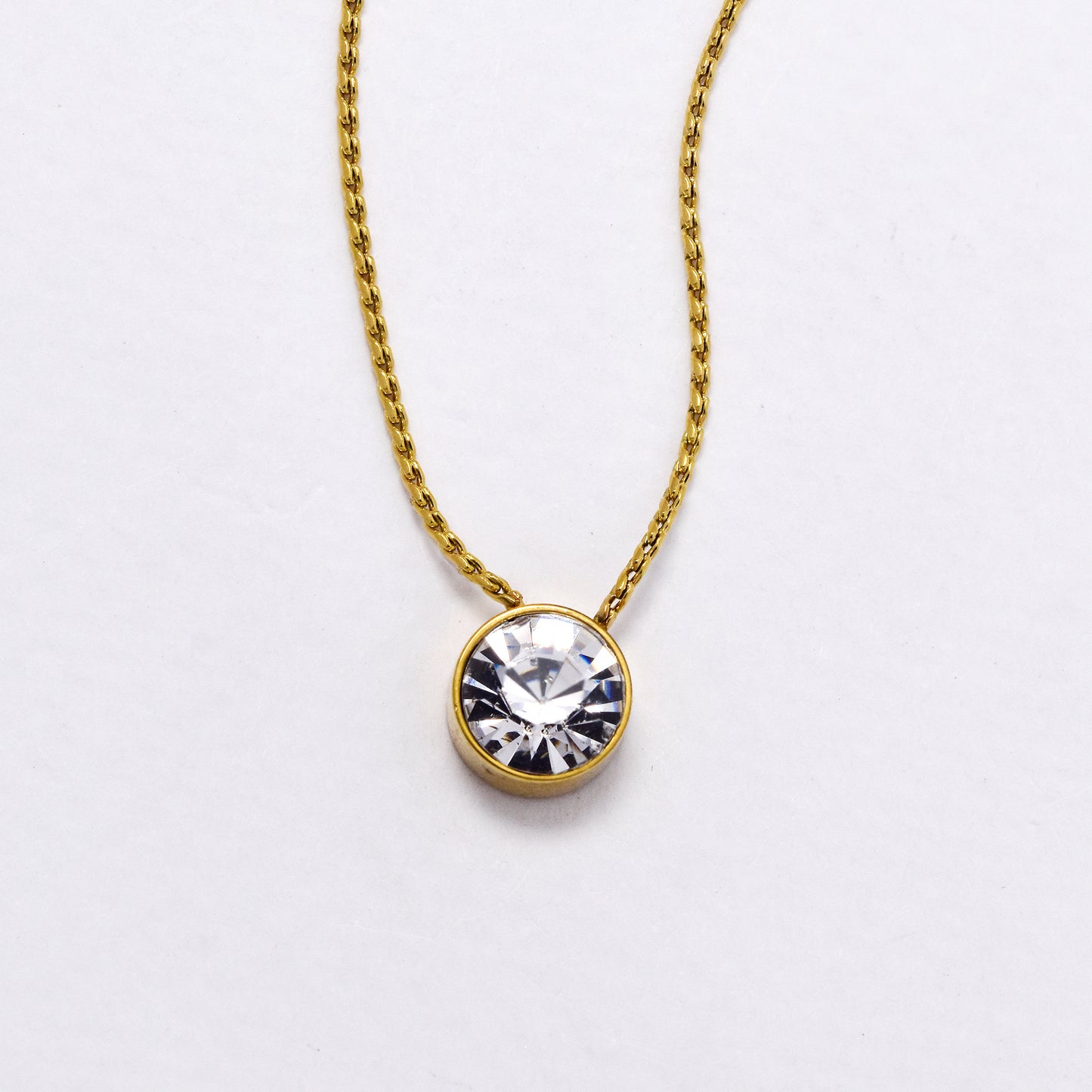 SSYN6026 - St Steel 42cm + 5cm round crystal pendant necklace