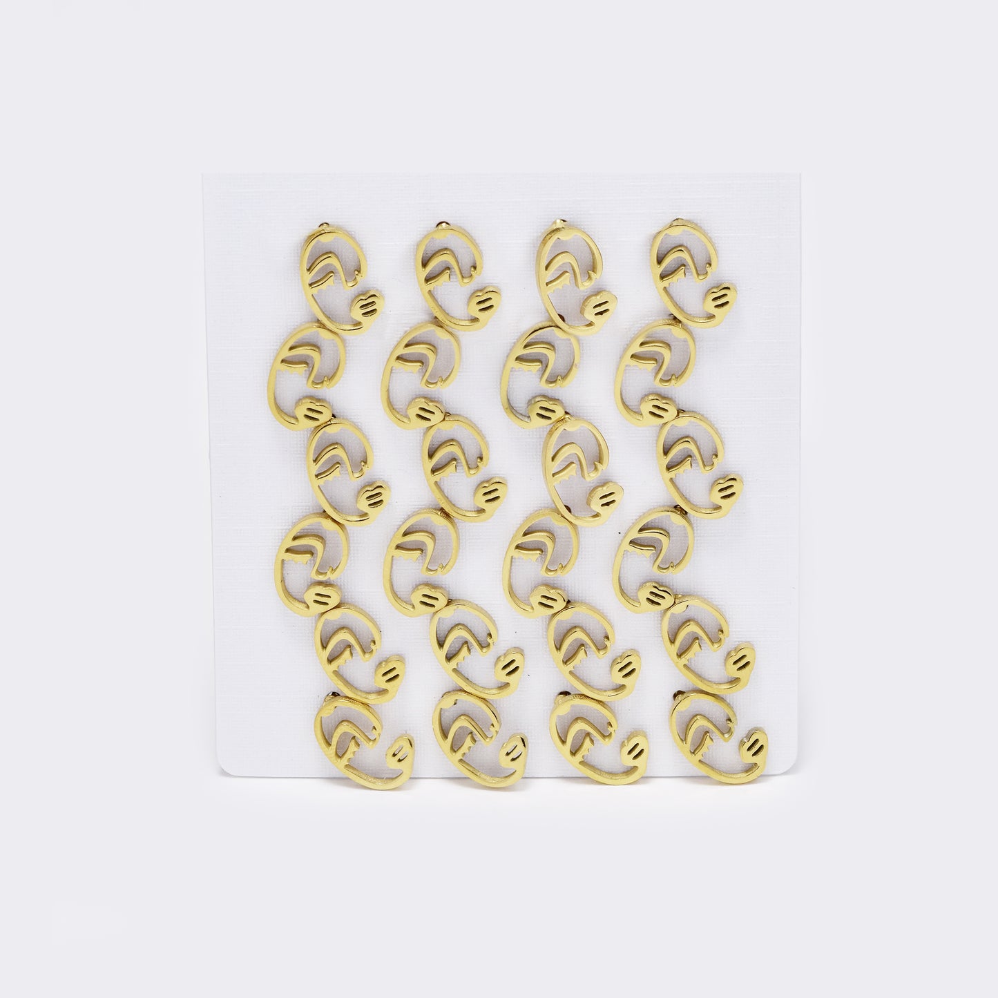 Stainless steel 12 pack half abstract face studs - SSYPK5412