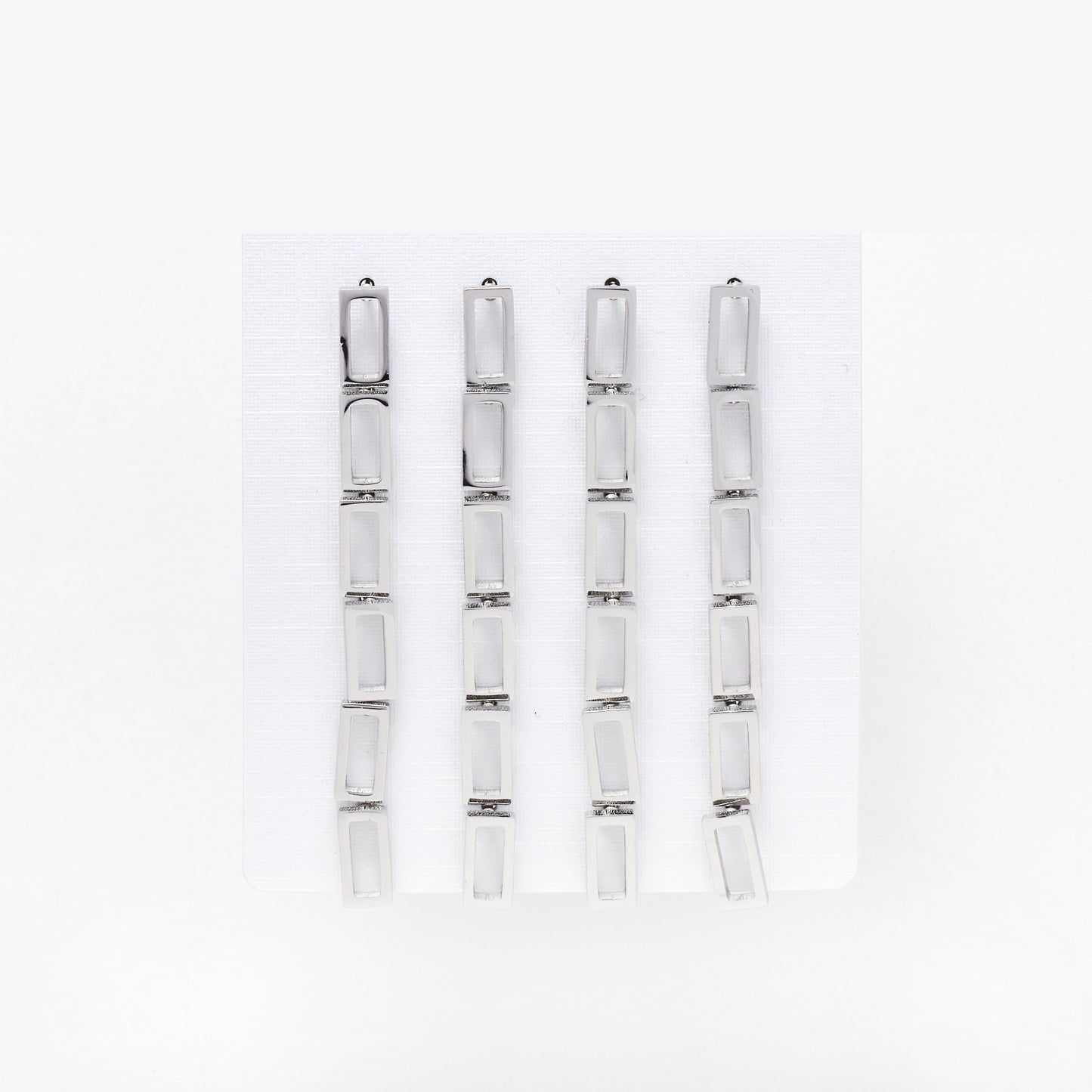 SSYPK6563 - St Steel 12 pack 10mm x 5mm cutout rectangular studs