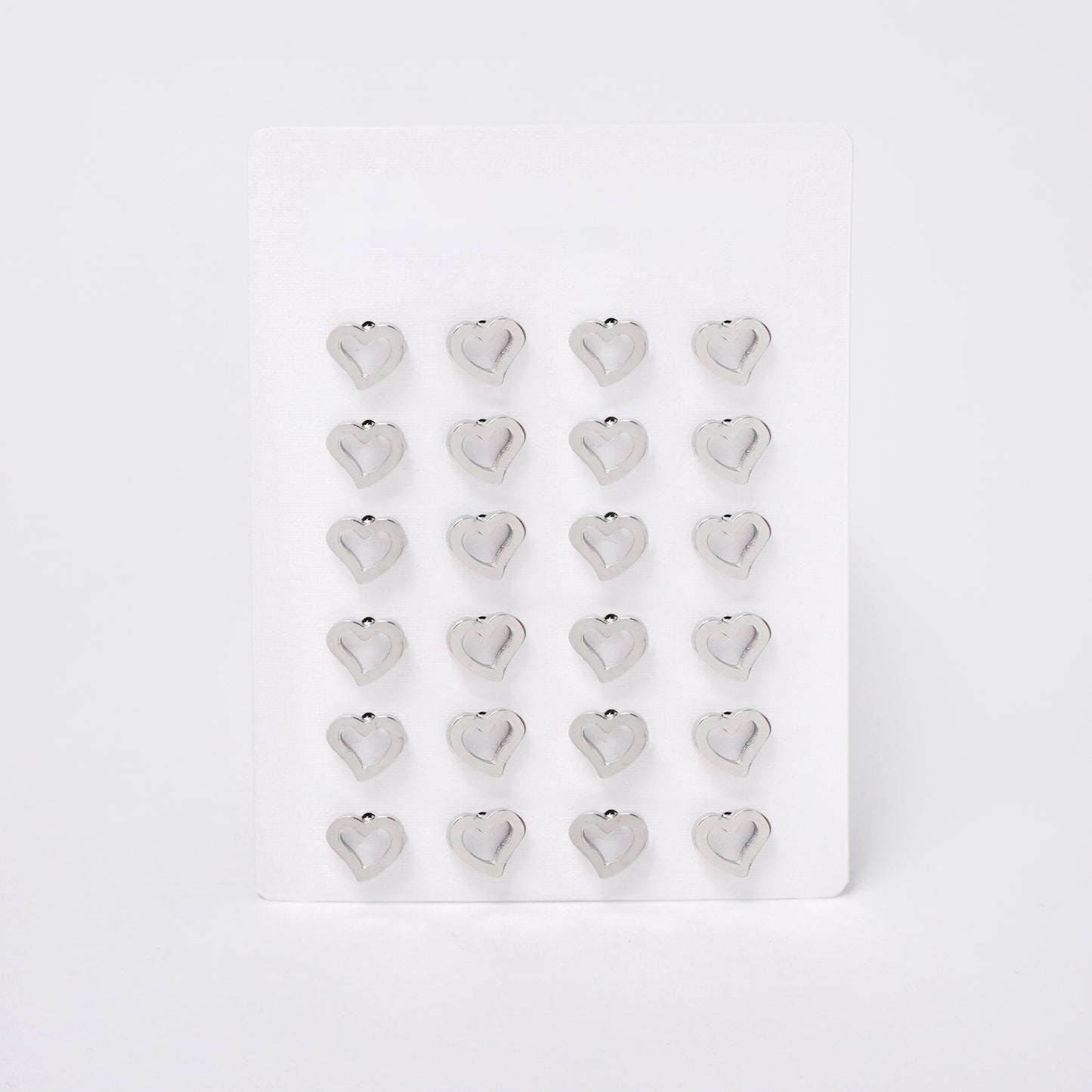 SSYPK7375 - Steel 12 pack curved heart stud earrings