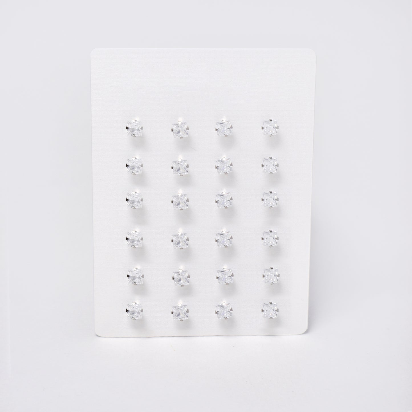 SSYPK7382 - Steel 12 pack 4mm square CZ stud earrings