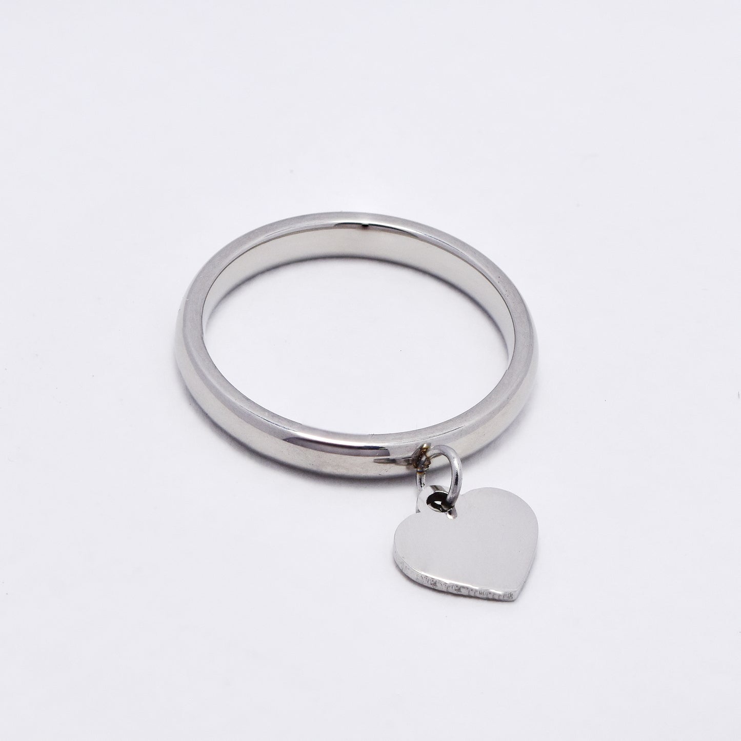 SSYR6102 - St Steel domed band with heart charm