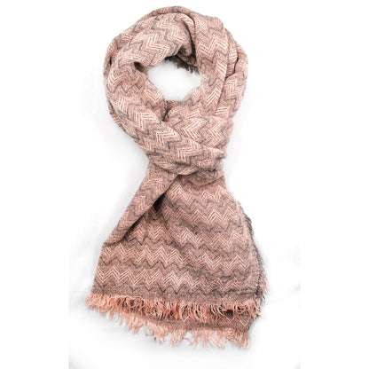 Zigzag pattern scarf with a fringe all the way around the scarf.