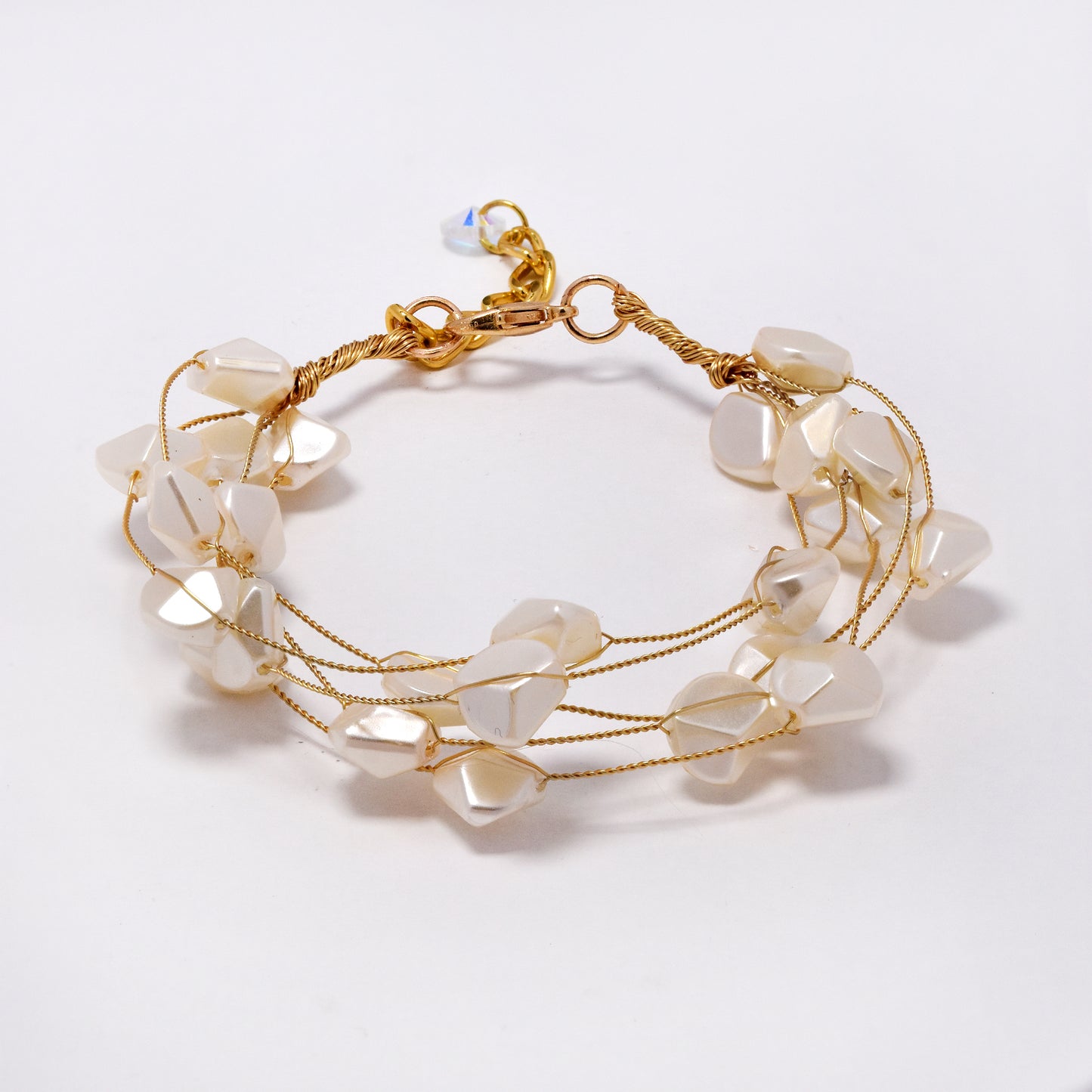 Intertwined multi strand irregular shaped faux pearl bracelet - YB5302