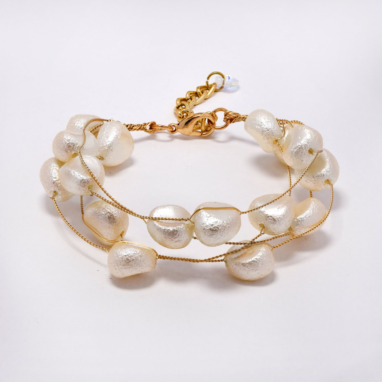Intertwined multi strand textured faux pearl bracelet - YB5303