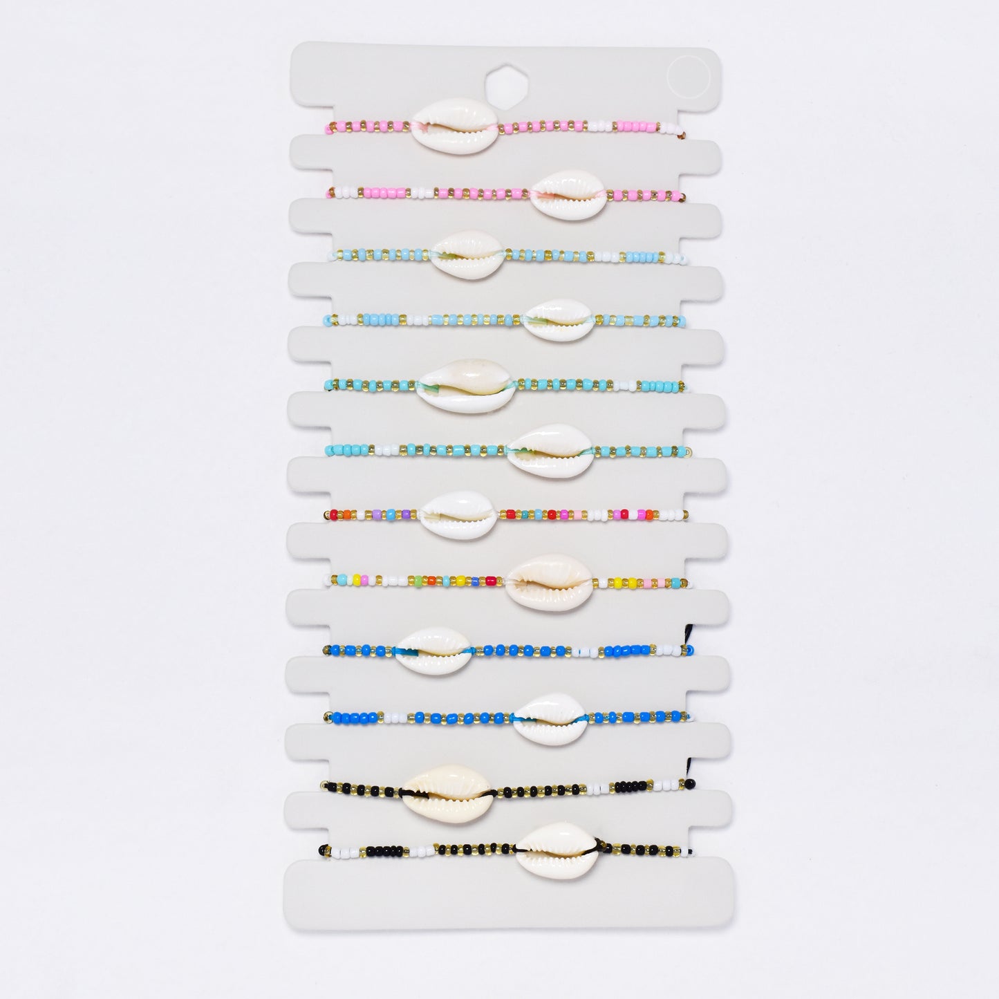 YB7541 - 12 Pack adjustable shell & bead bracelet
