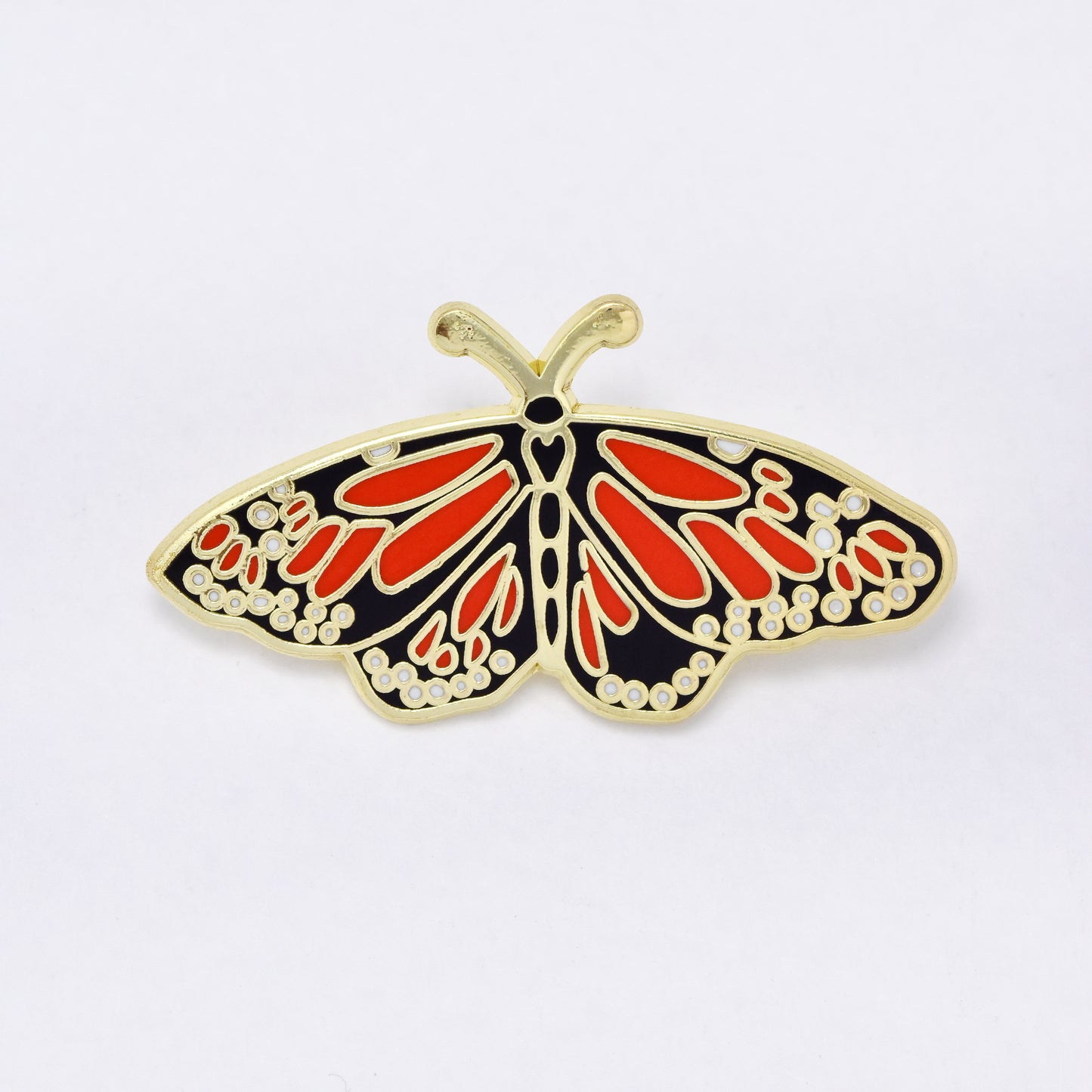 YBR6336 - Fashion butterfly with red & white speckles brooch