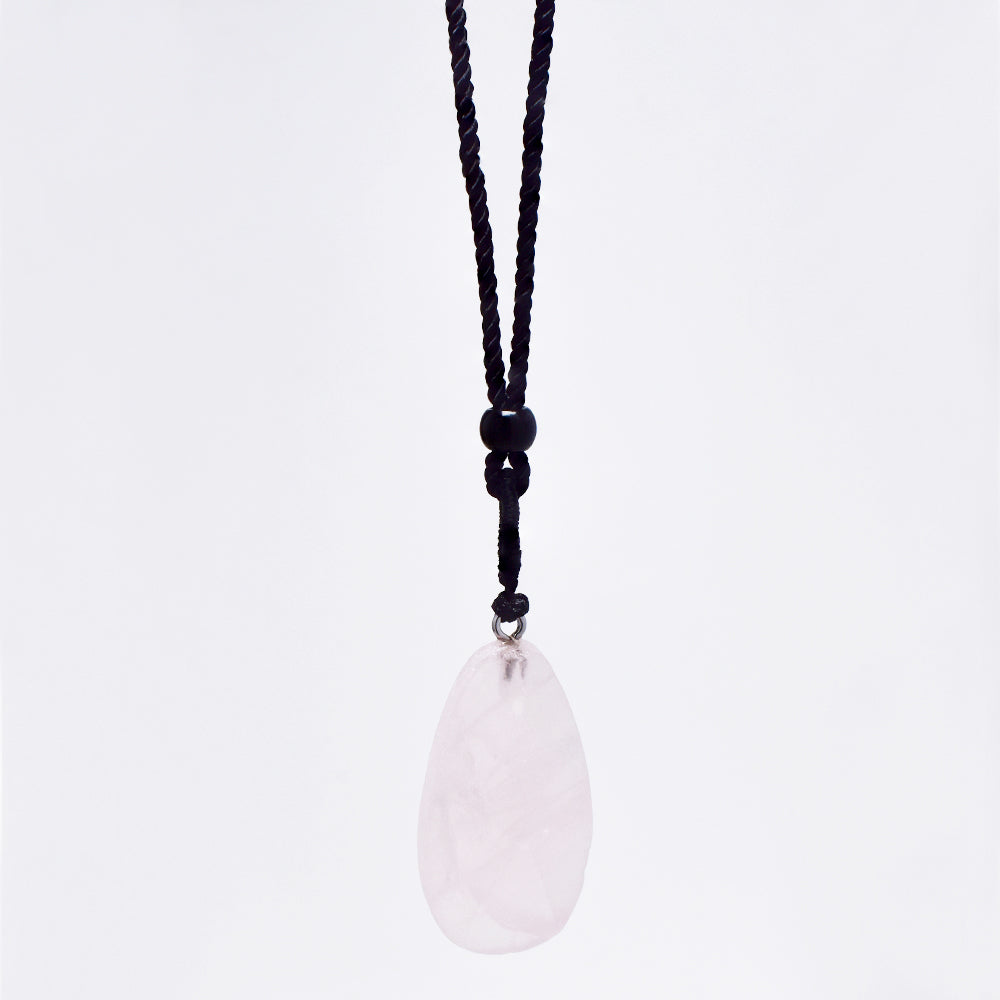Fashion statement longer length pink stone pendant on black rope - YN4939