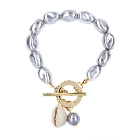 T bar pearl and shell charm bracelet