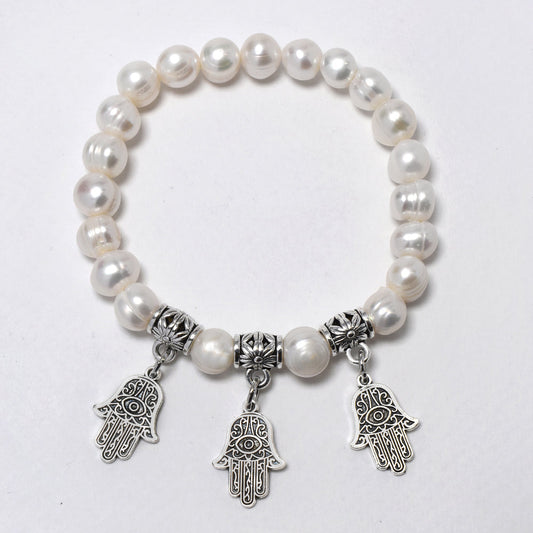 White 8mm freshwater pearl with hamsa hand charms stretch bracelet