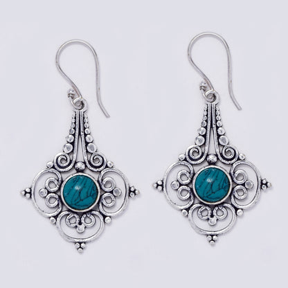 Brass kite shape decorative swirl earring with gemstones