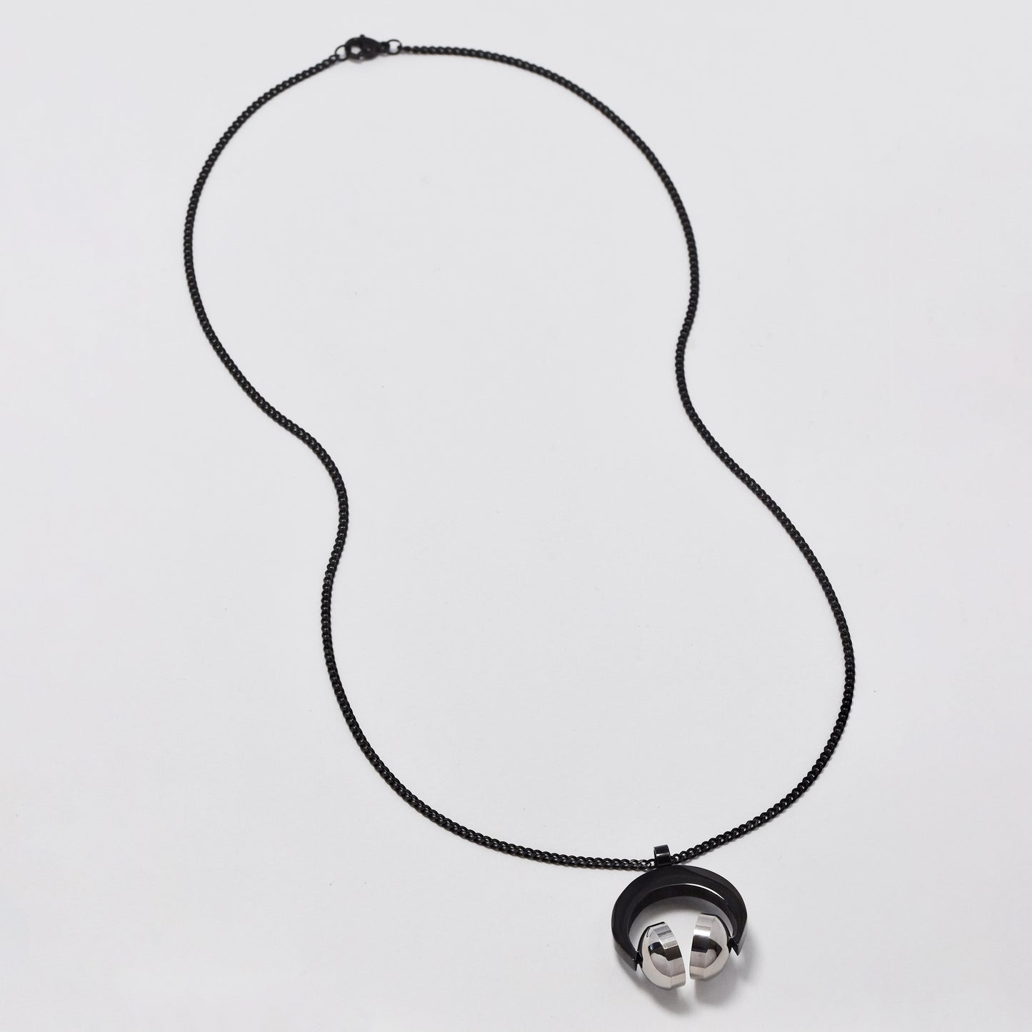 NCSSN036i - Steel two toned headphone necklace