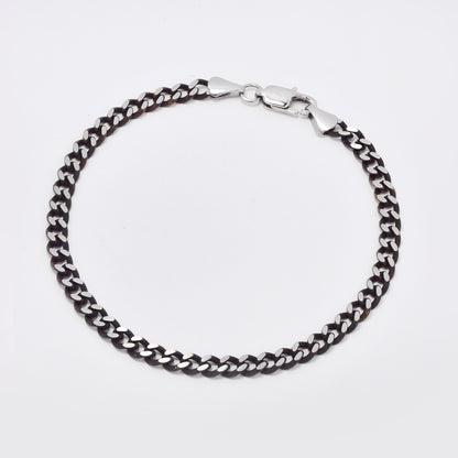 SSMB3106 - Steel 21cm x 4mm oxidised flat curb bracelet