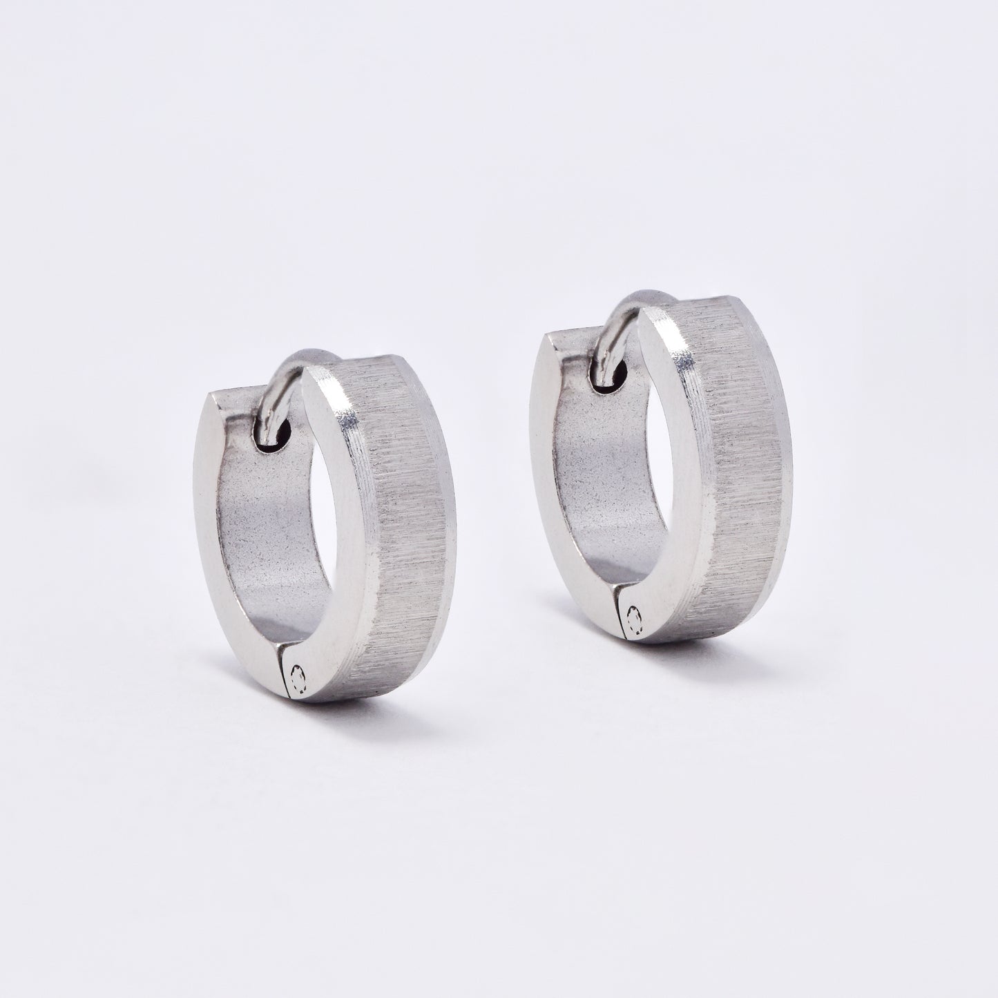 SSME3144 - Steel 13mm x 4mm brushed center huggie earrings
