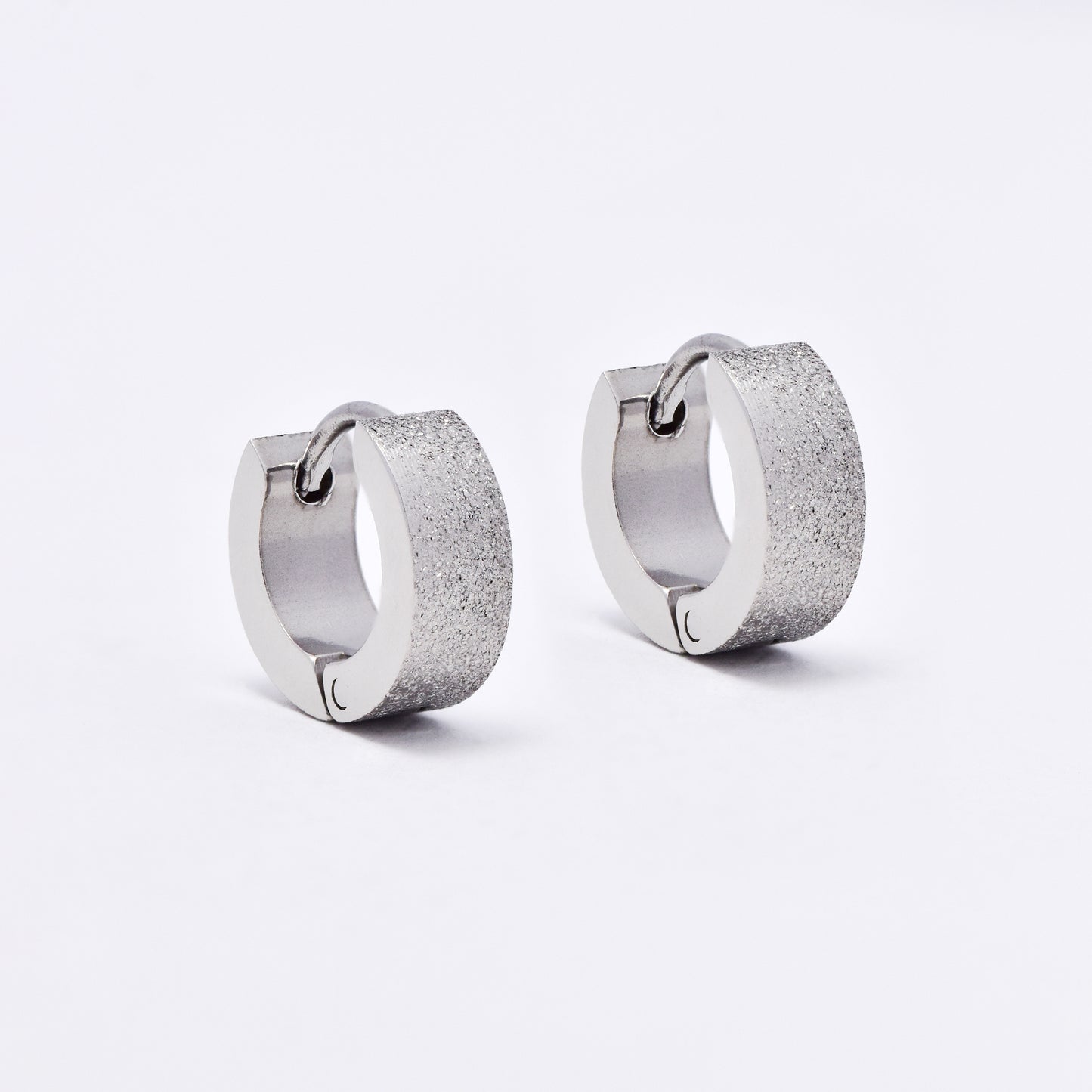 SSME3151 - Steel 11mm x 4mm iced huggie earrings
