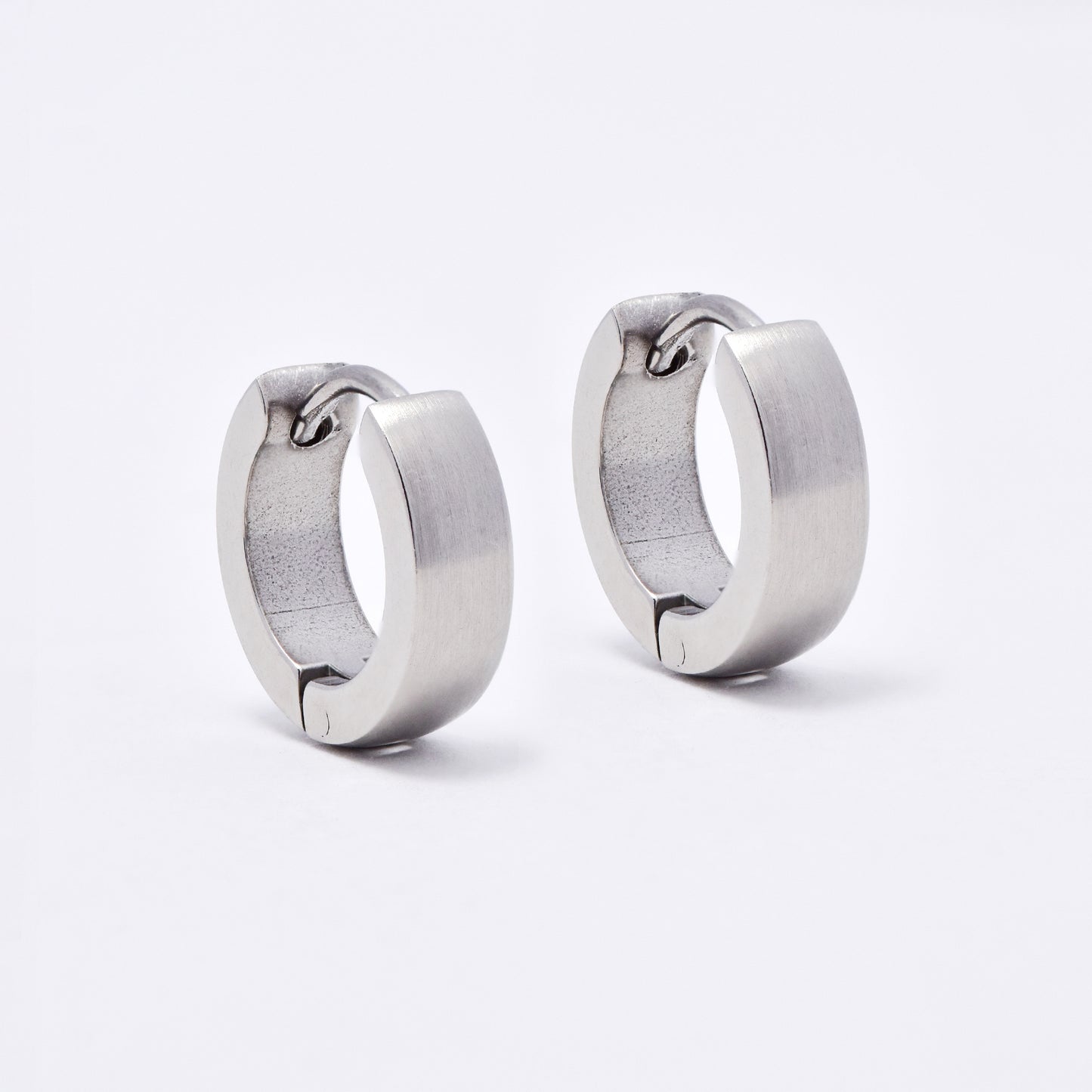 SSME3155 - Steel 13mm x 4mm plain matte huggie earrings