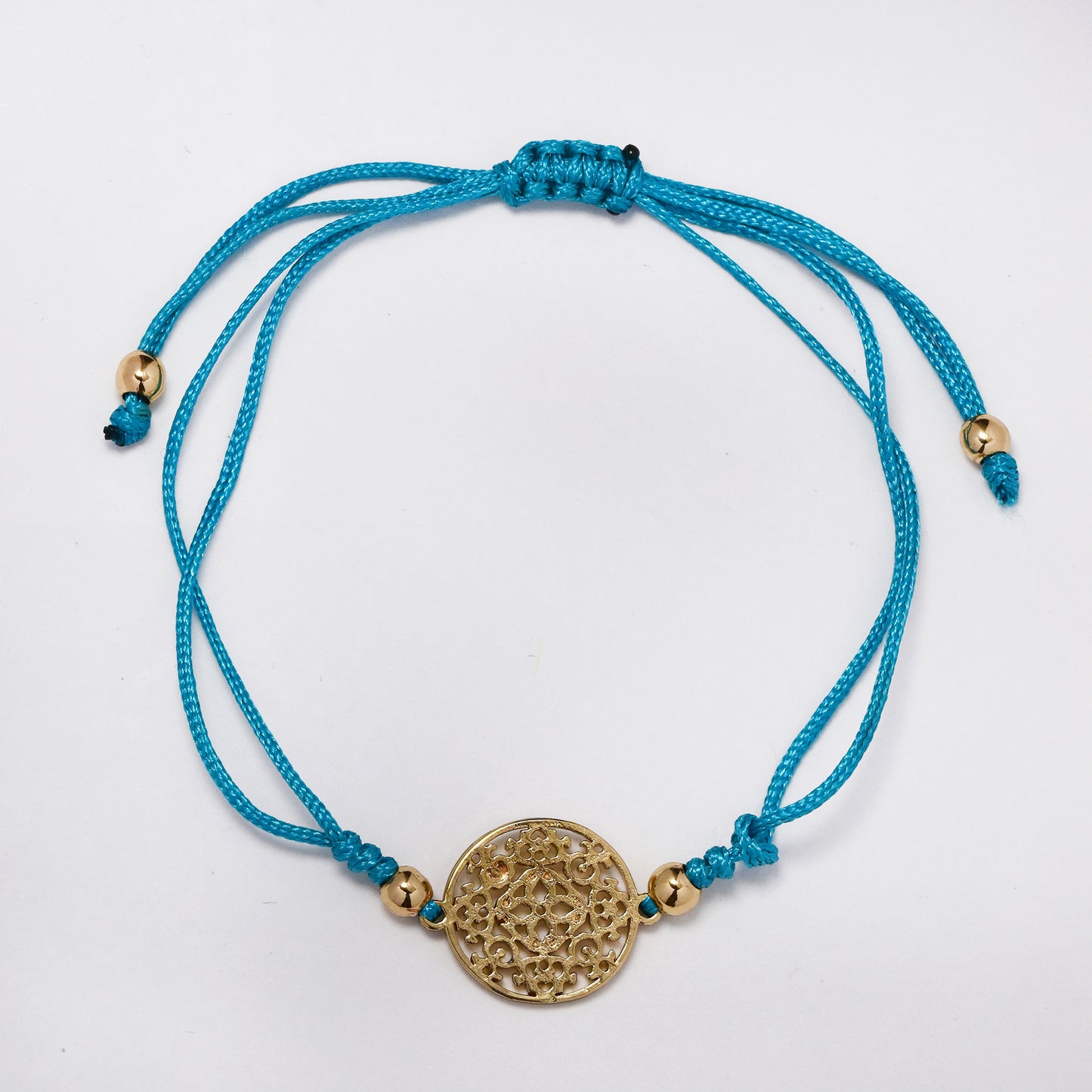 Adjustible thread bracelet with decorative stainless steel disk - SSYB5319