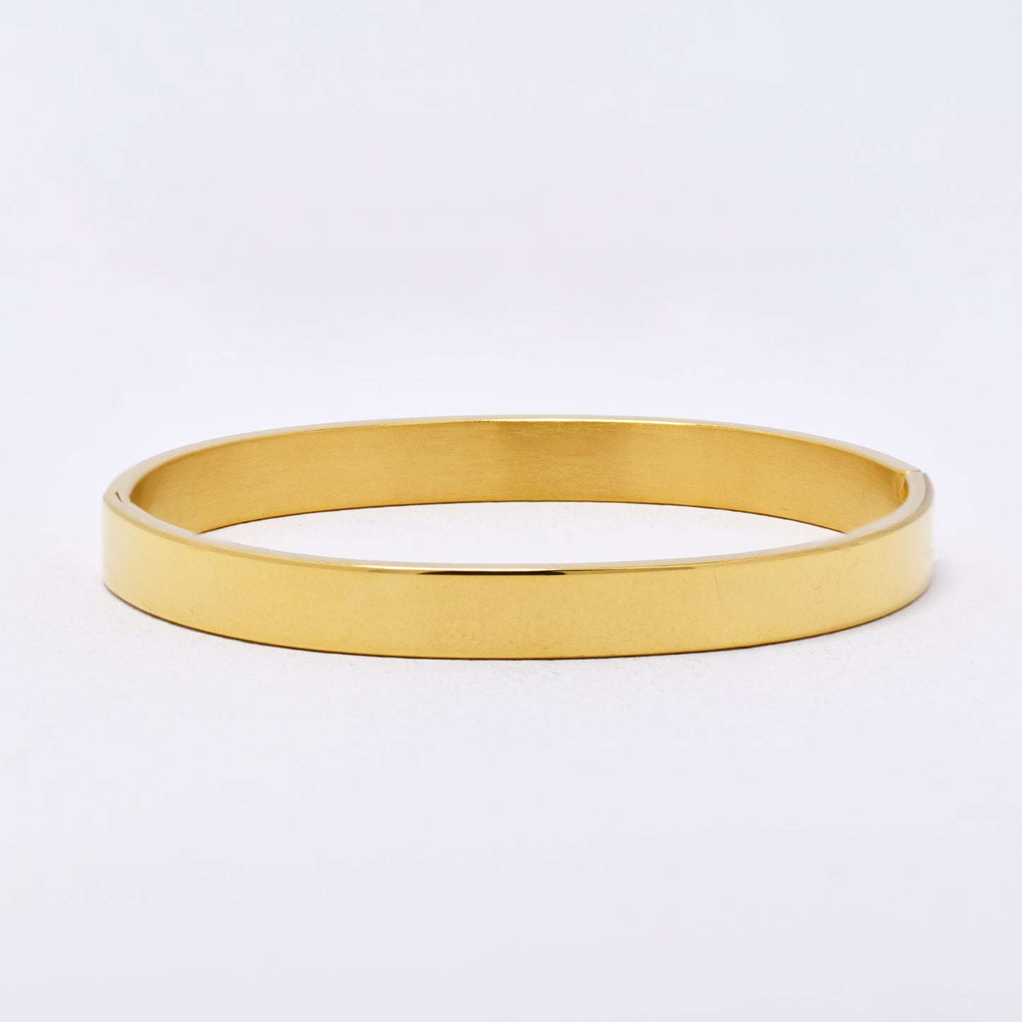 SSYB6301 - St Steel 75mm x 62mm x  8mm flat hinged bangle