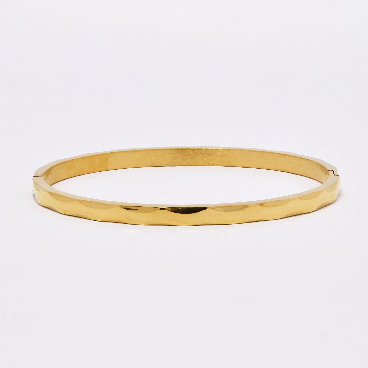 SSYB6436 - St Steel 60mm x 50mm x 4mm oval hinged faceted bangle