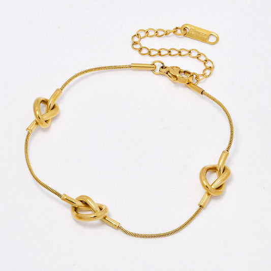 SSYB6544 - St Steel 17cm + 4.5cm tripple knot bracelet