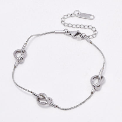 SSYB6544 - St Steel 17cm + 4.5cm tripple knot bracelet