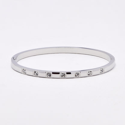 SSYB6612 - St Steel 65mm x 56mm x 4mm oval hinged CZ bangle
