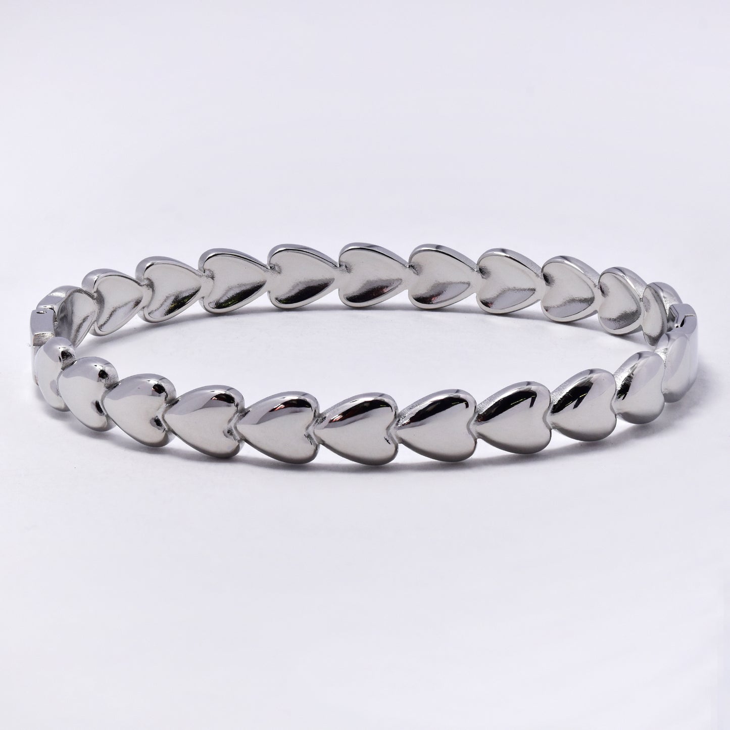SSYB6789 - Steel 60mm x 51mm x 6.5mm heart oval hinged bangle