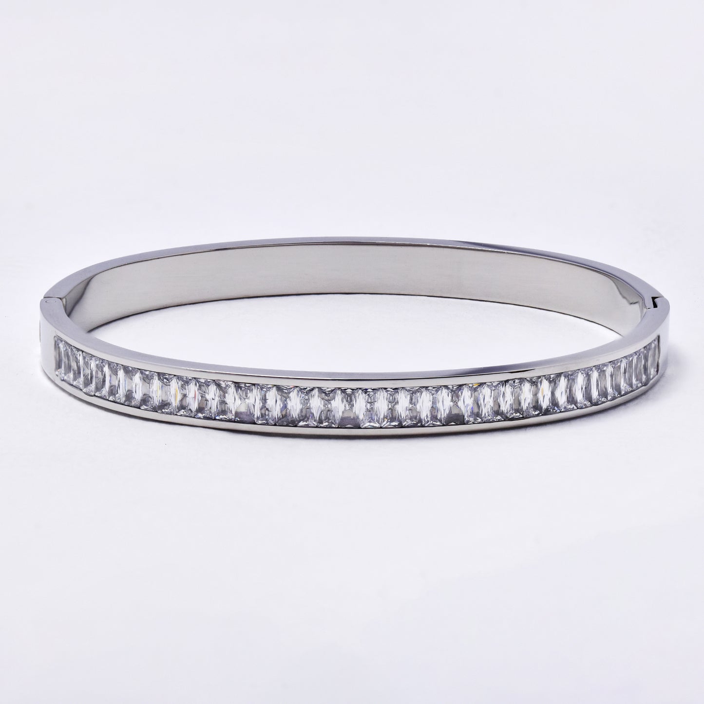 SSYB6790 - Steel 58mm x 48mm x 6mm oval hinged CZ bangle