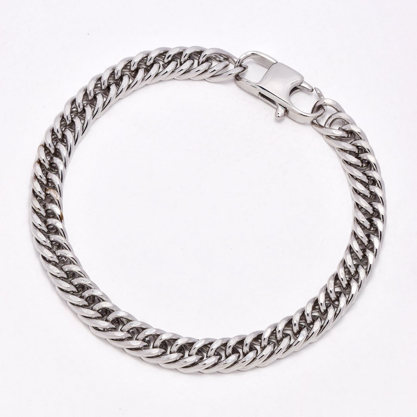 SSYB6924 - St Steel 7mm x 21cm tight curb bracelet