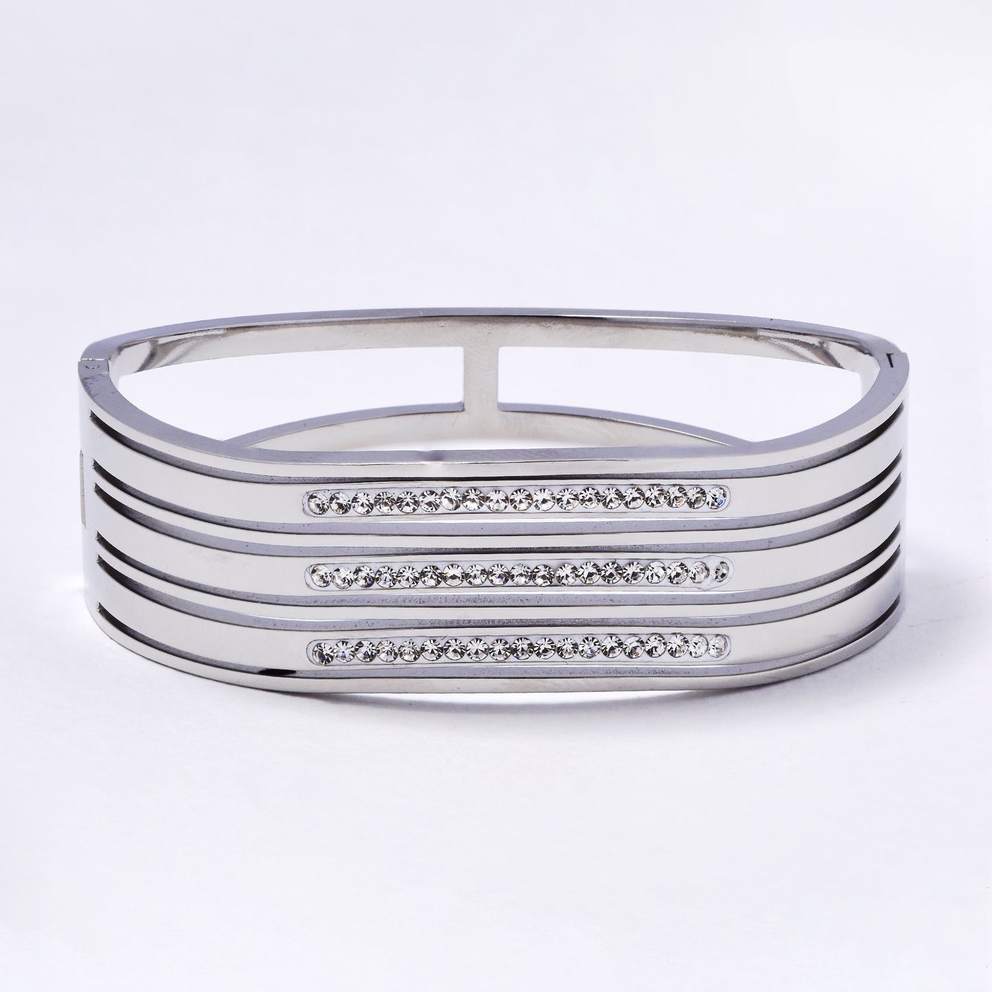 SSYB6989 - Steel 59mm x 50mm x 19mm wavy CZ hinged bangle