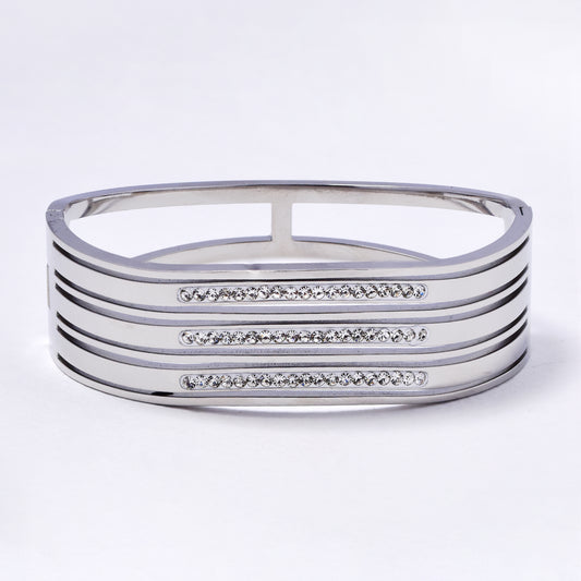 SSYB6989 - Steel 59mm x 50mm x 19mm wavy CZ hinged bangle